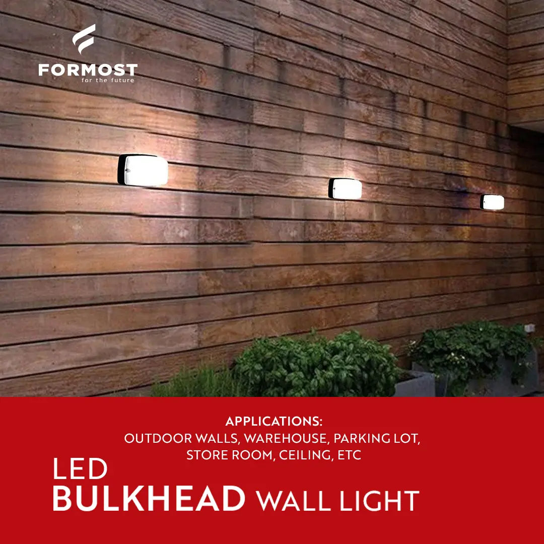 LED bulkhead wall lights on a wooden wall with Formost branding.