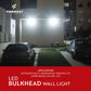 LED bulkhead wall light in use on a building exterior with cars parked below.