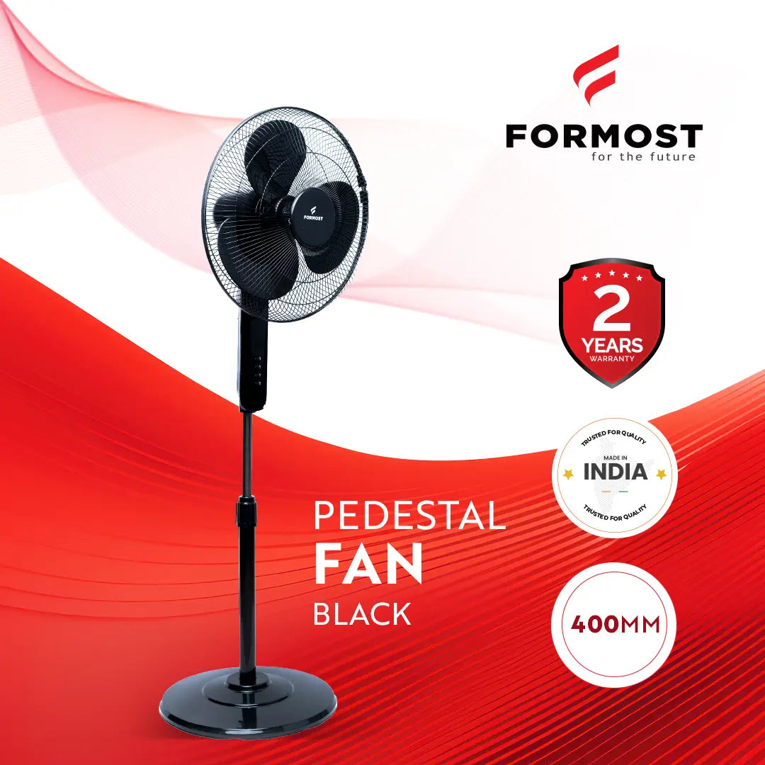 Black pedestal fan on a red and white background with Formost branding.